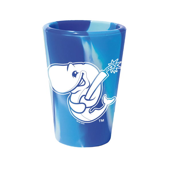 A silicone shot glass with a blue and white design featuring an cartoon whale.