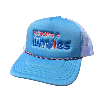 Blue Trucker cap with 'Exploding Whales' text on a white background