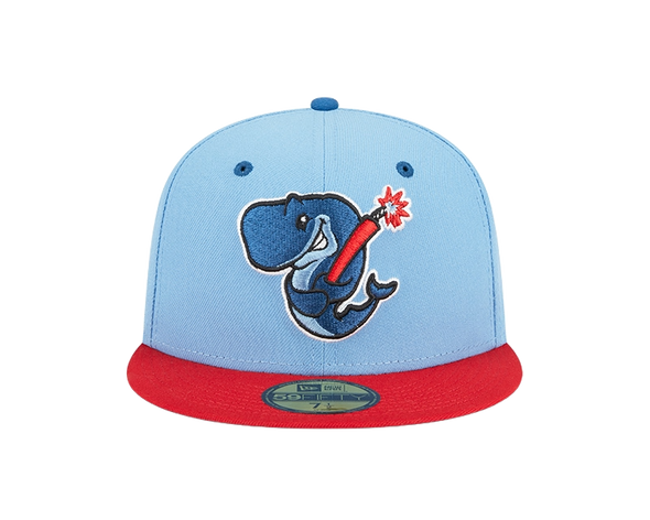 A fitted, baby blue and red cap with an embroidered Exploding Whales mark on the front.